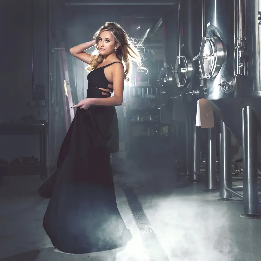 Model wearing a balck dress